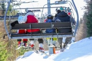 GERARDMER, FRANCE - FEB 19 - Skier using the ski lift during the annual winter school holiday on Feb 19, 2015 in Gerardmer, France